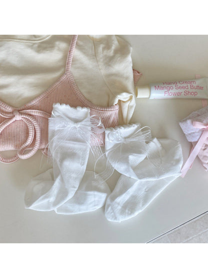 Side view of Rufia Romantic Ribbon Trim Socks emphasizing ribbon trim and texture