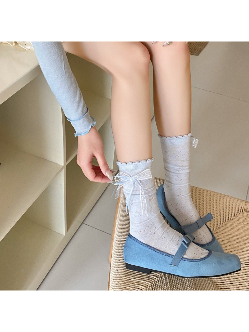 Model wearing Rufia Romantic Ribbon Trim Socks styled with casual shoes