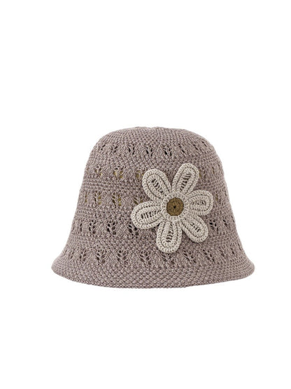 Close-up of flower embellishment on Haila open weave flower hat