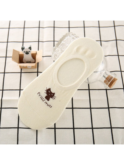 Stack of Rufia Everyday Cat No Show Socks in white with cat face design
