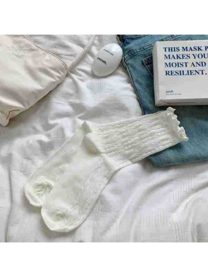 Rufia Cozy Wave Pattern Socks folded neatly with visible wave pattern