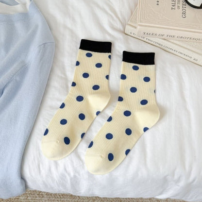Close-up of Rufia Dot Color Block Contrast mid-calf socks fabric texture and pattern