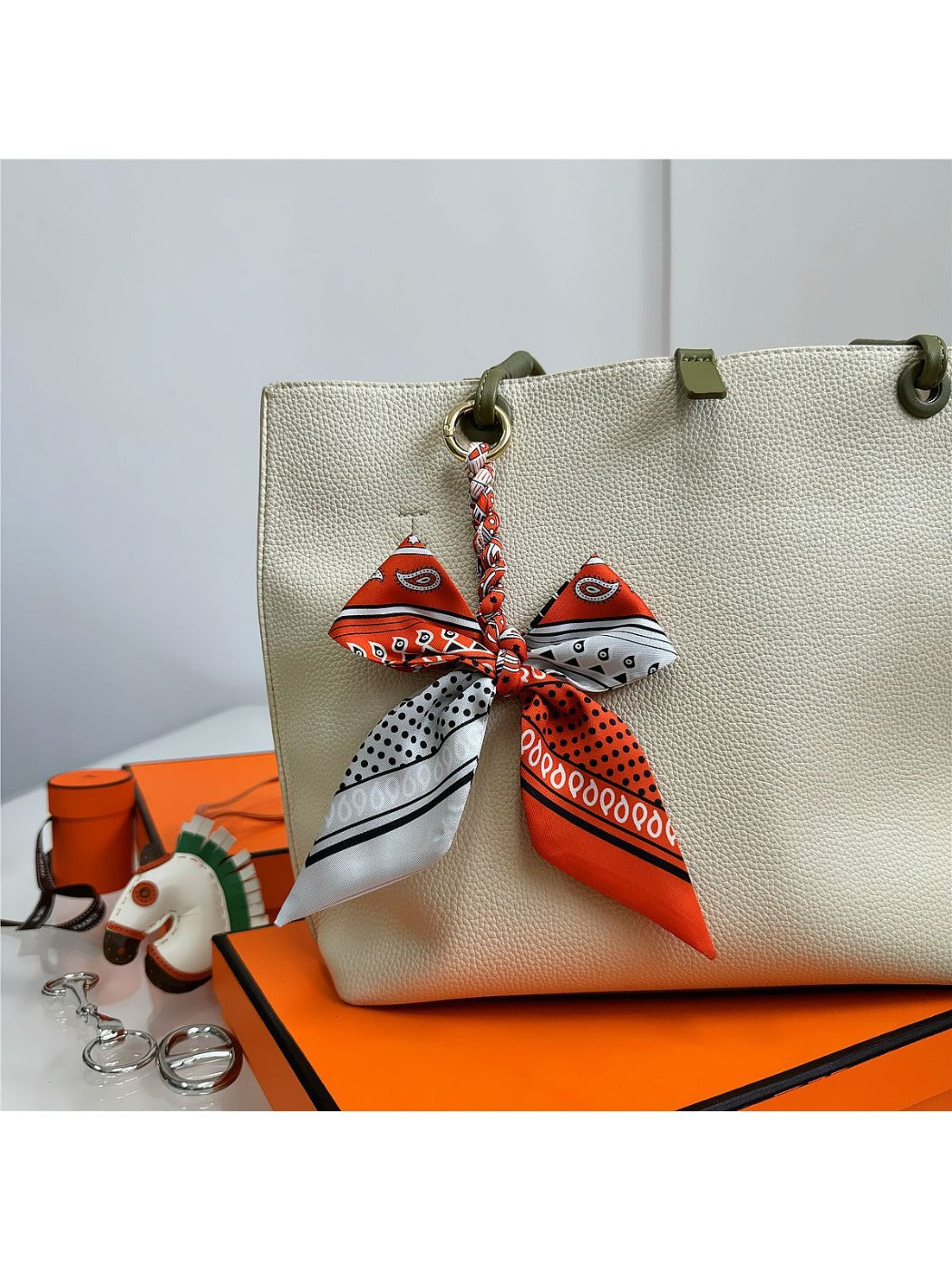 Koco Elegant Bow Bag Charm with bow detail and ribbon detail