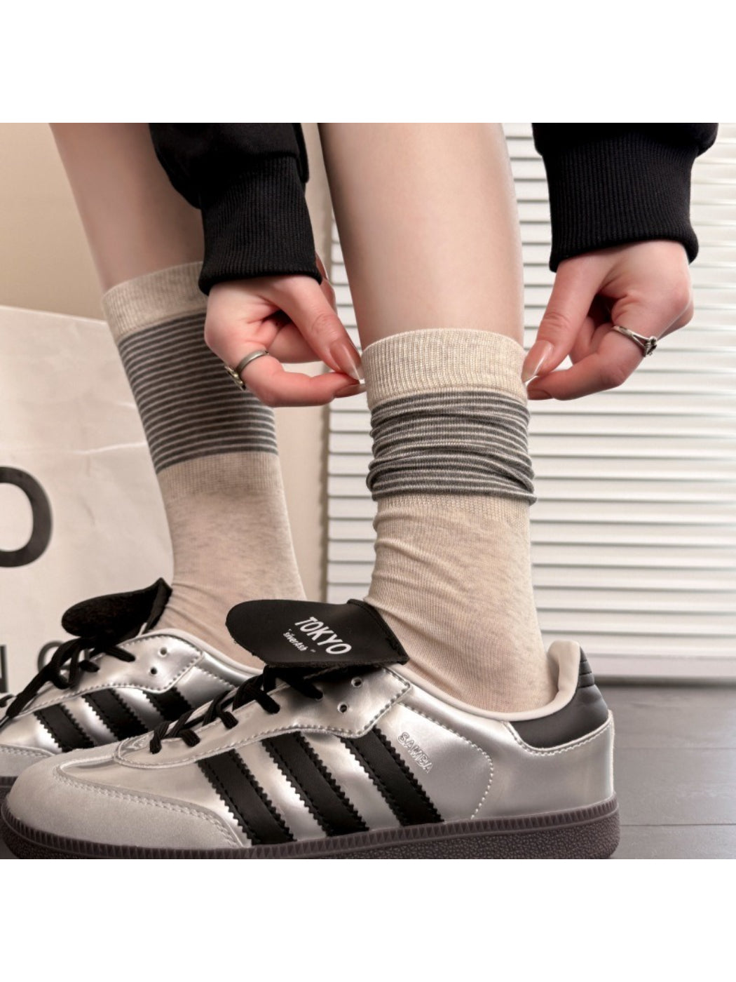 Close-up of Rufia ribbed stripe mid-calf socks highlighting ribbed texture and stripes