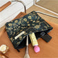 Close-up of Cosbai dark floral cosmetic bag showing detailed floral design