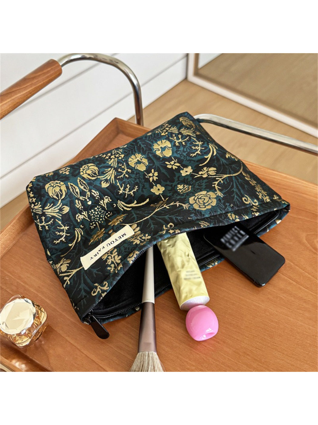 Close-up of Cosbai dark floral cosmetic bag showing detailed floral design