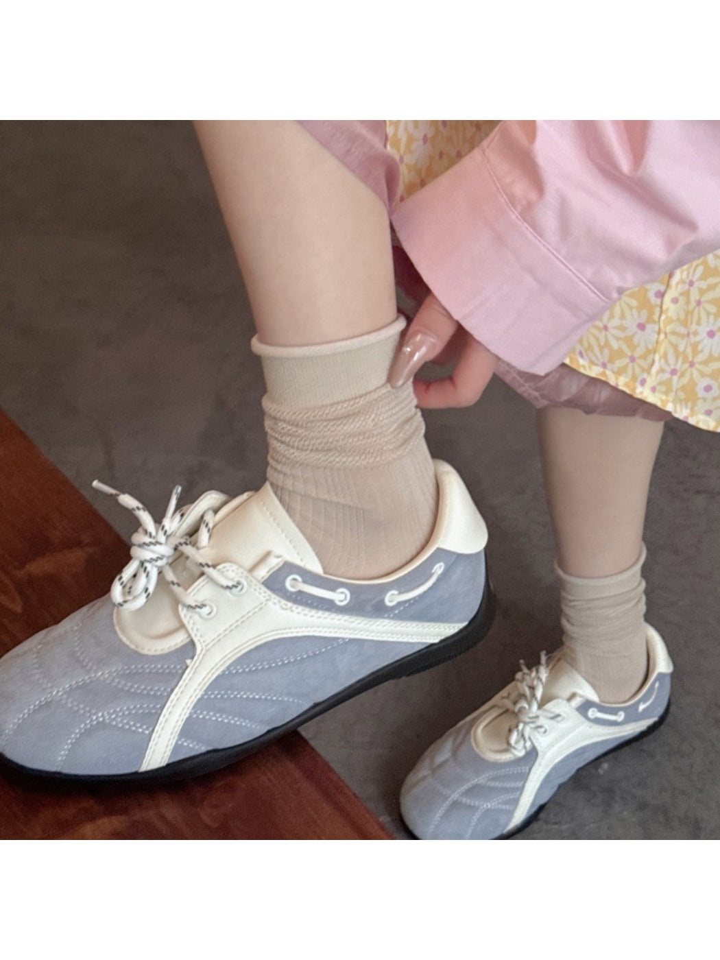 Close-up of Rufia soft knit crew sock fabric texture in light gray