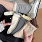 Pair of Rufia ribbed crew socks with ruffle accent in soft beige color