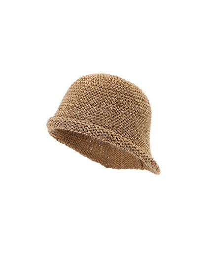 Side view of Haila soft texture bucket hat in beige on a plain background