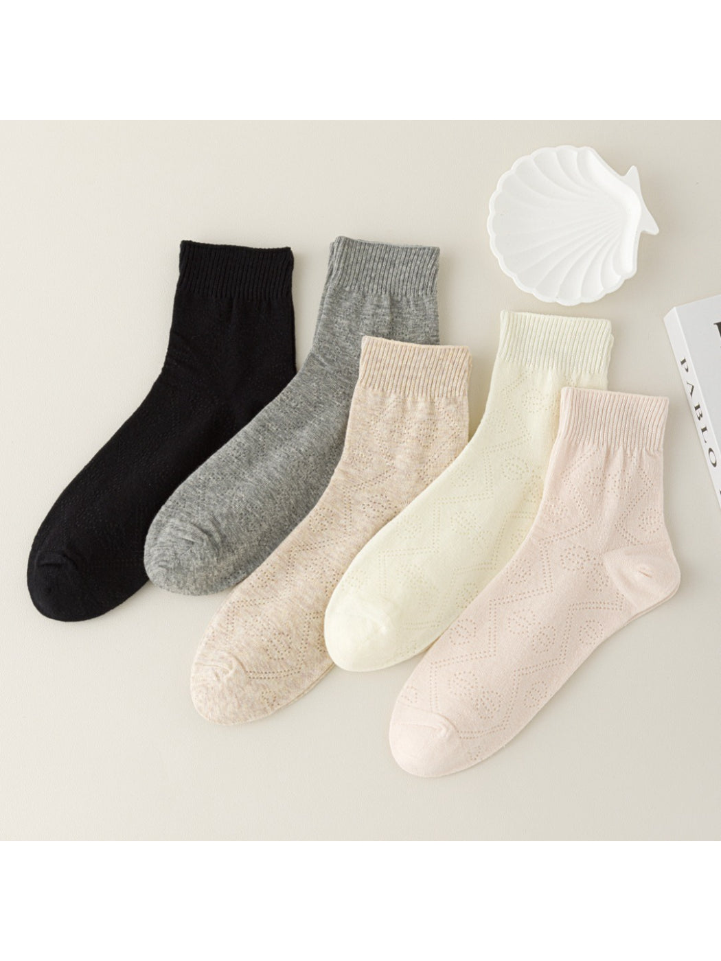 Close-up of Rufia Pointelle Ribbon Crew Socks showing ribbed cuff and textured knit