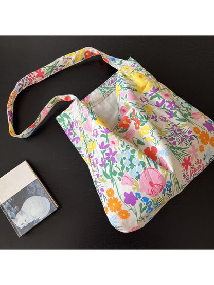 Cosbai Meadow Bloom Slouch Tote Bag worn over shoulder by model