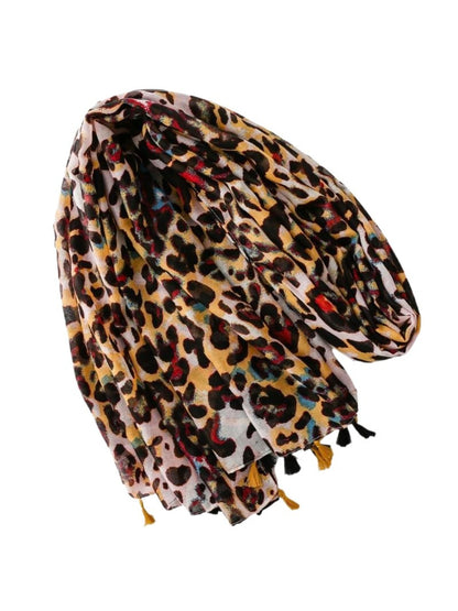 Scarvii Colour Splash Leopard Tassel Scarf laid flat displaying vibrant colors and tassel fringe