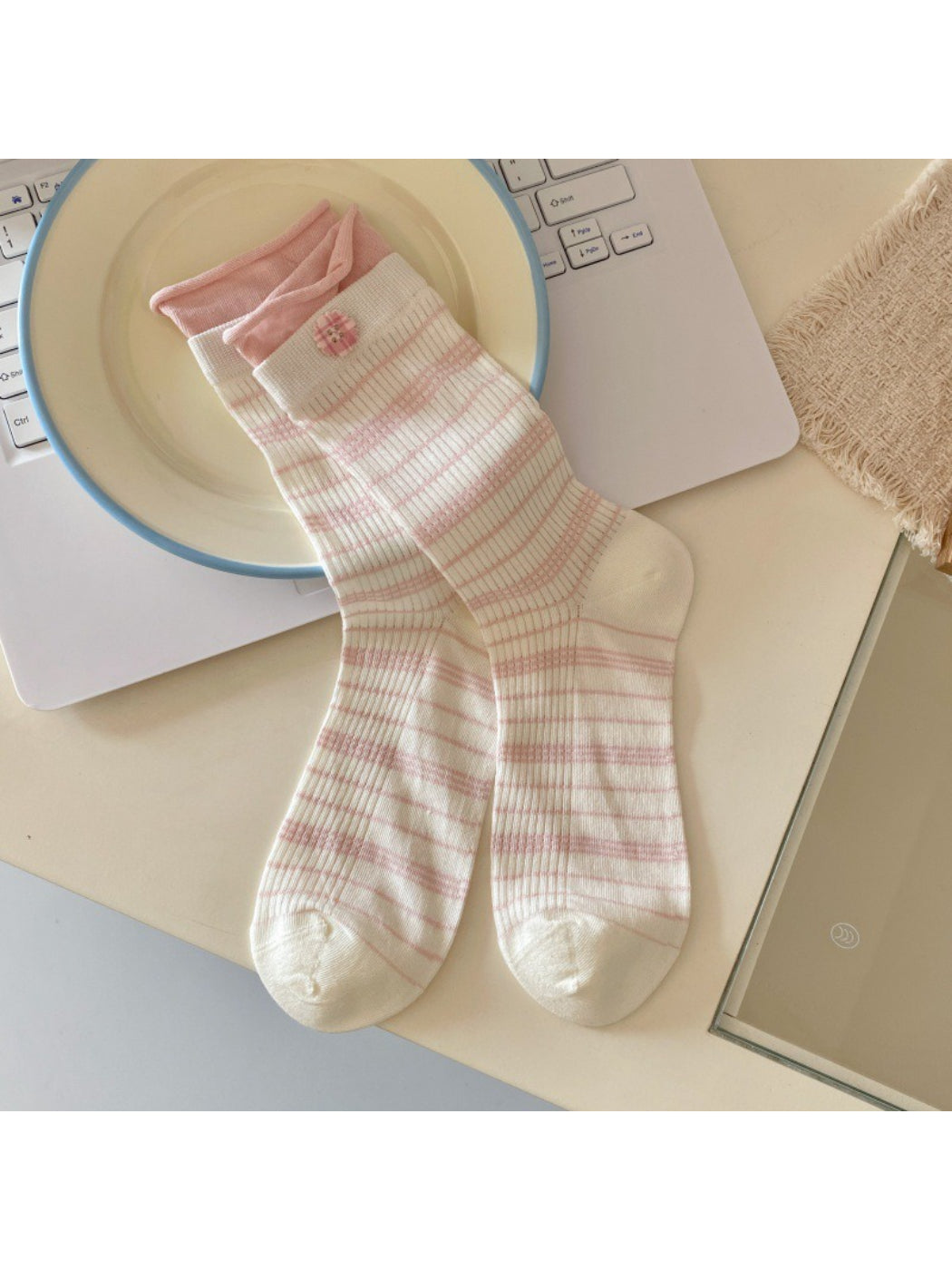 Rufia ribbed socks with button detail styled with rolled-up pants