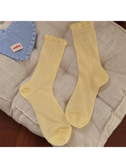Rufia minimal animal crew socks folded to show soft fabric texture and animal design