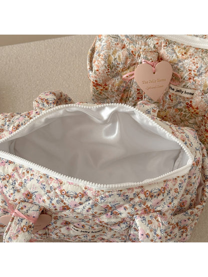 Top view of Cosbai Quilted Floral Duffle Bag with zipper partially open