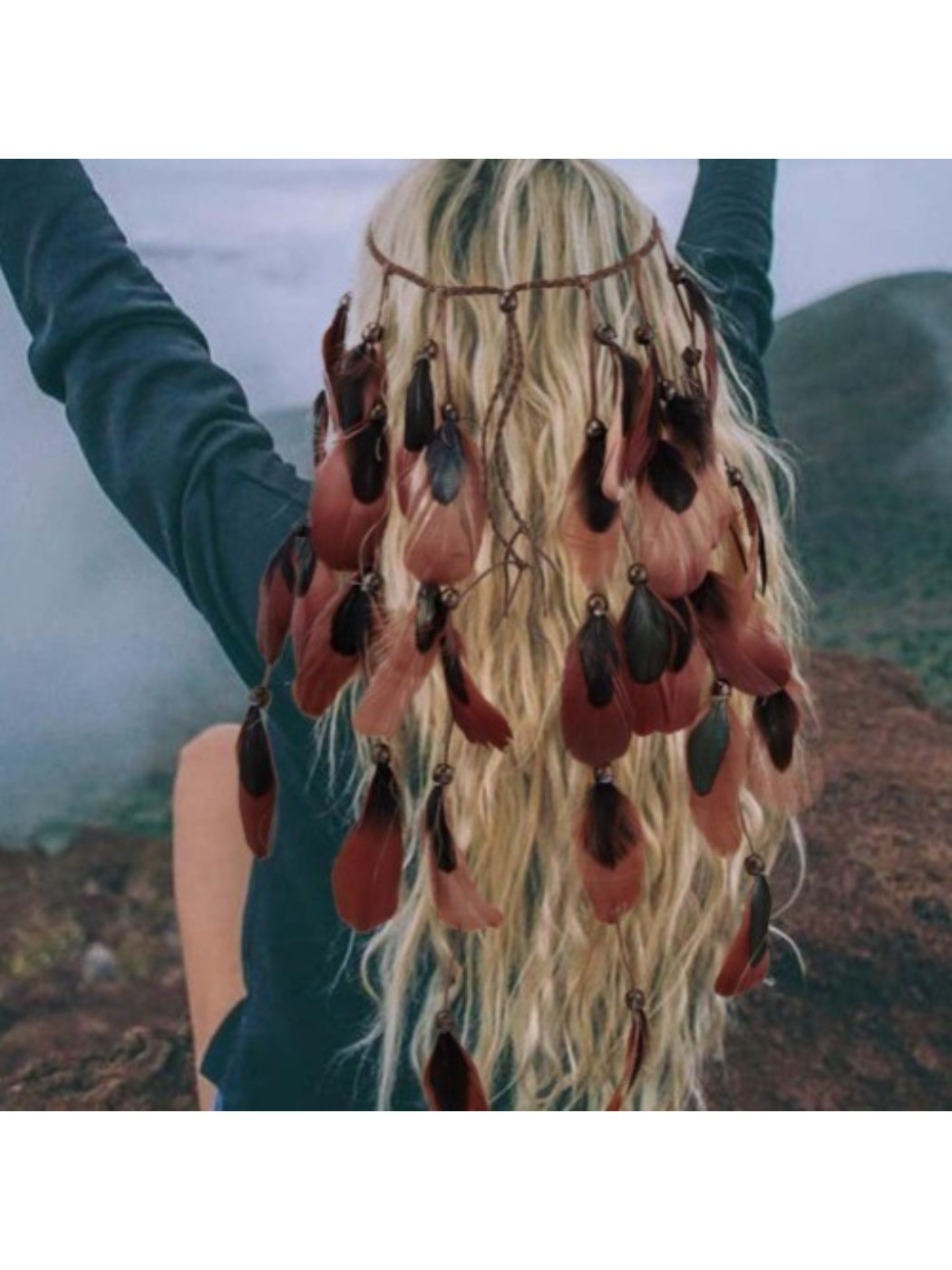 Close-up of boho feather hair headpiece showing detailed feather arrangement