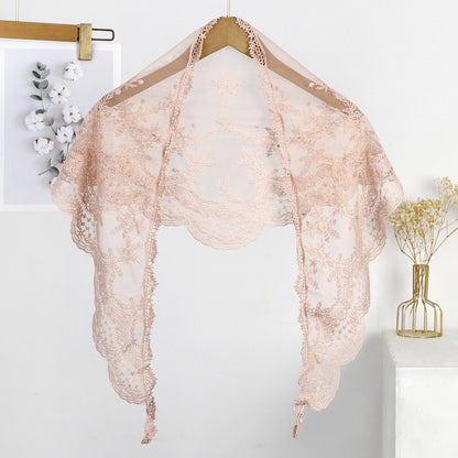 Model wearing Haila baroque lace triangle veil scarf with sheer fabric and ornate design