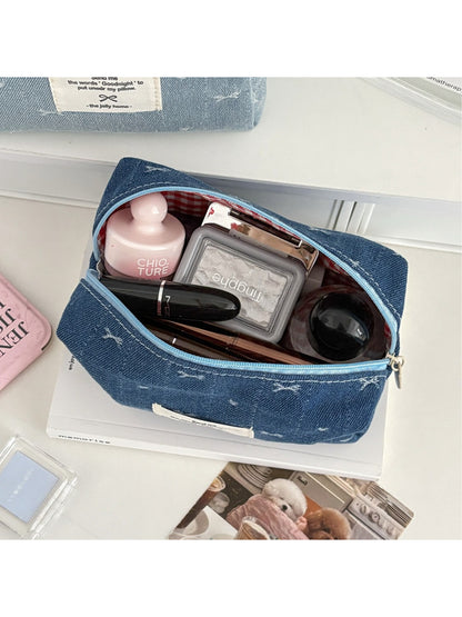 Close-up of Cosbai denim makeup pouch fabric texture and stitching details