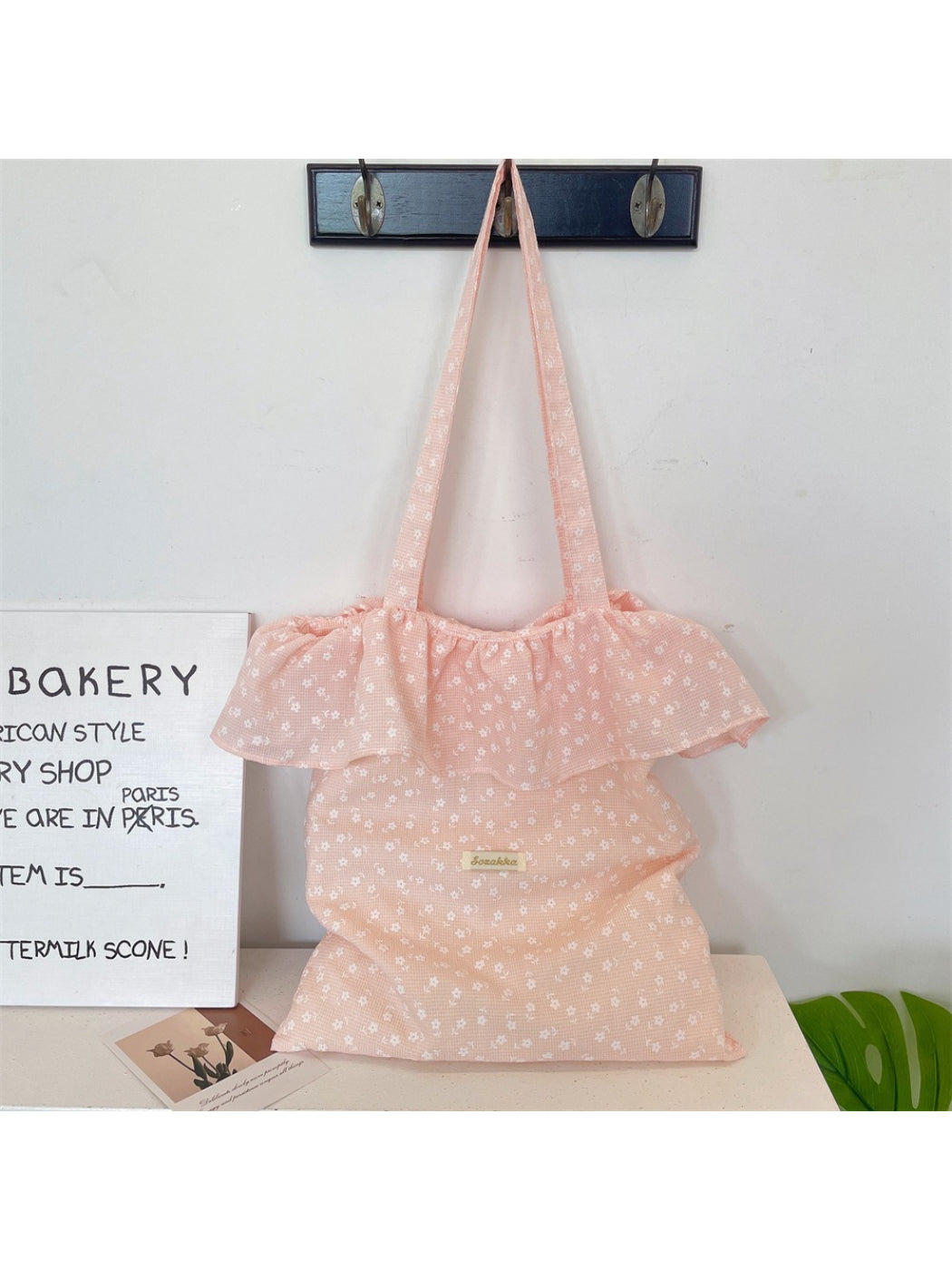 Close-up of Cosbai Tiny Floral Ruffle Tote Bag highlighting ruffle detail and floral print