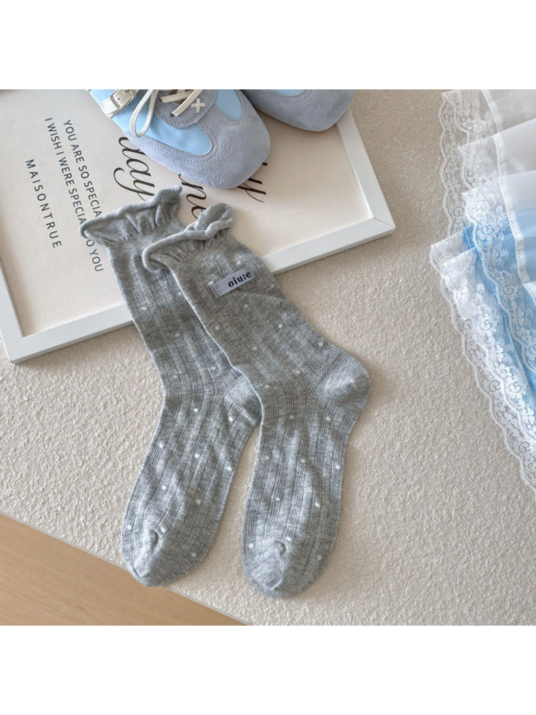 Rufia Sweet Blue and Grey crew socks packaged with branding label