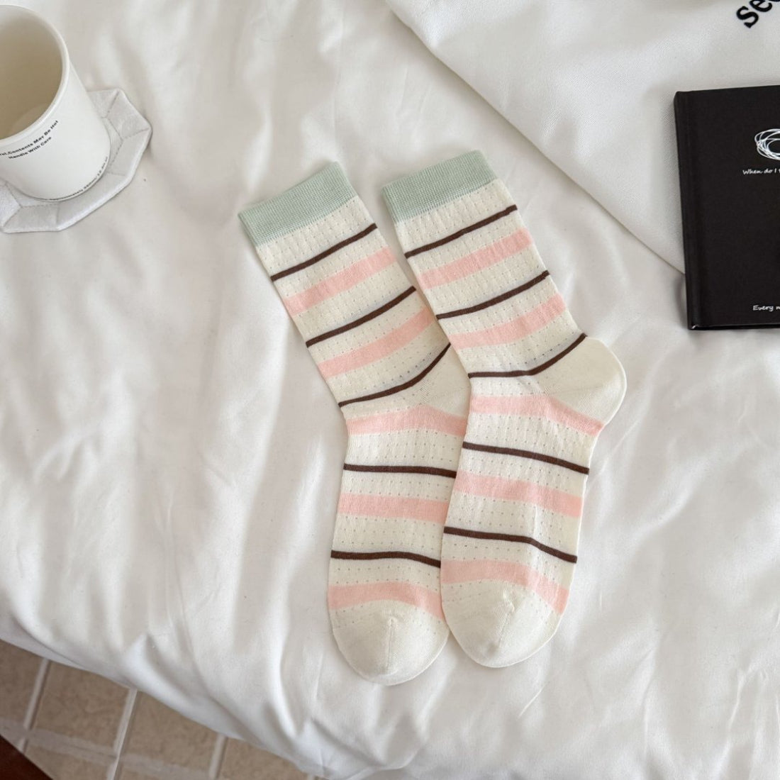 Rufia soft flecked knit crew socks displayed on wooden surface