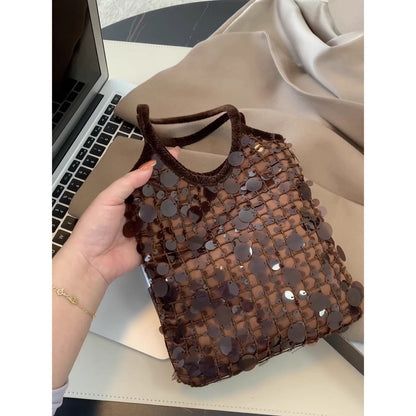 Cosbai chocolate sequin mini handbag shown open with interior lining visible