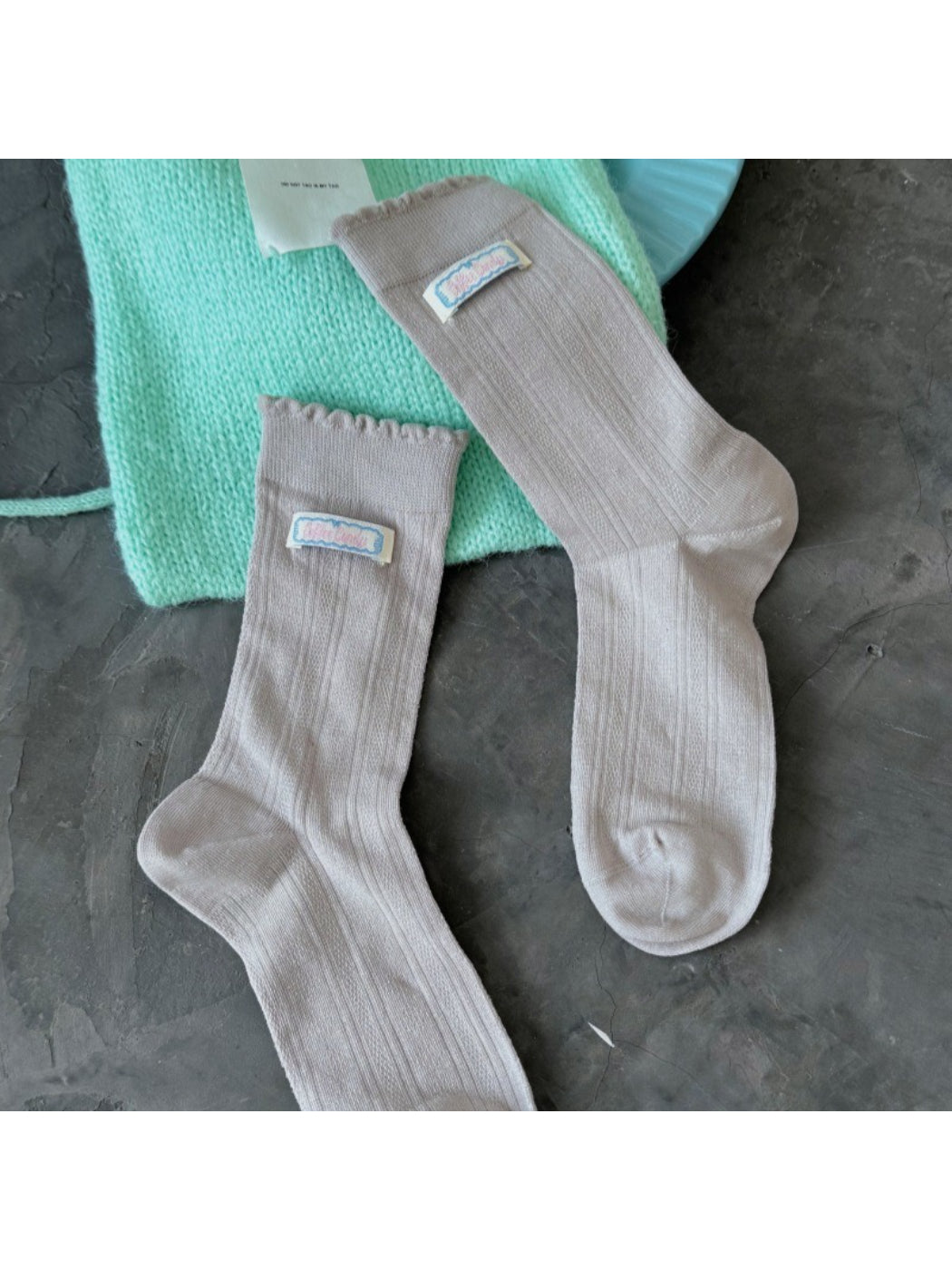 Rufia soft scallop trim socks worn on feet showing fit and texture