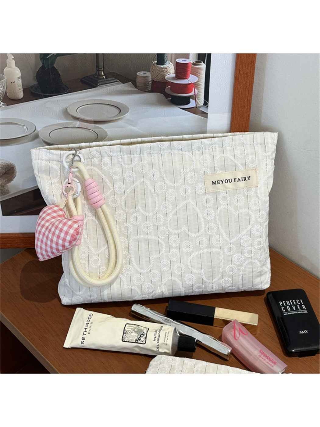Cosbai heart print pouch standing upright showing full front design