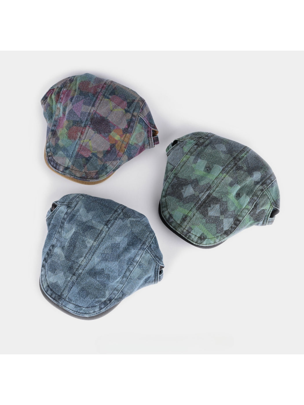Side angle of Haila washed denim plaid vintage newsboy cap showing pattern details