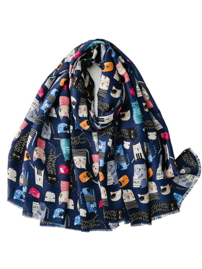 Close-up of vibrant cat sketch pattern on Scarvii colourful scarf