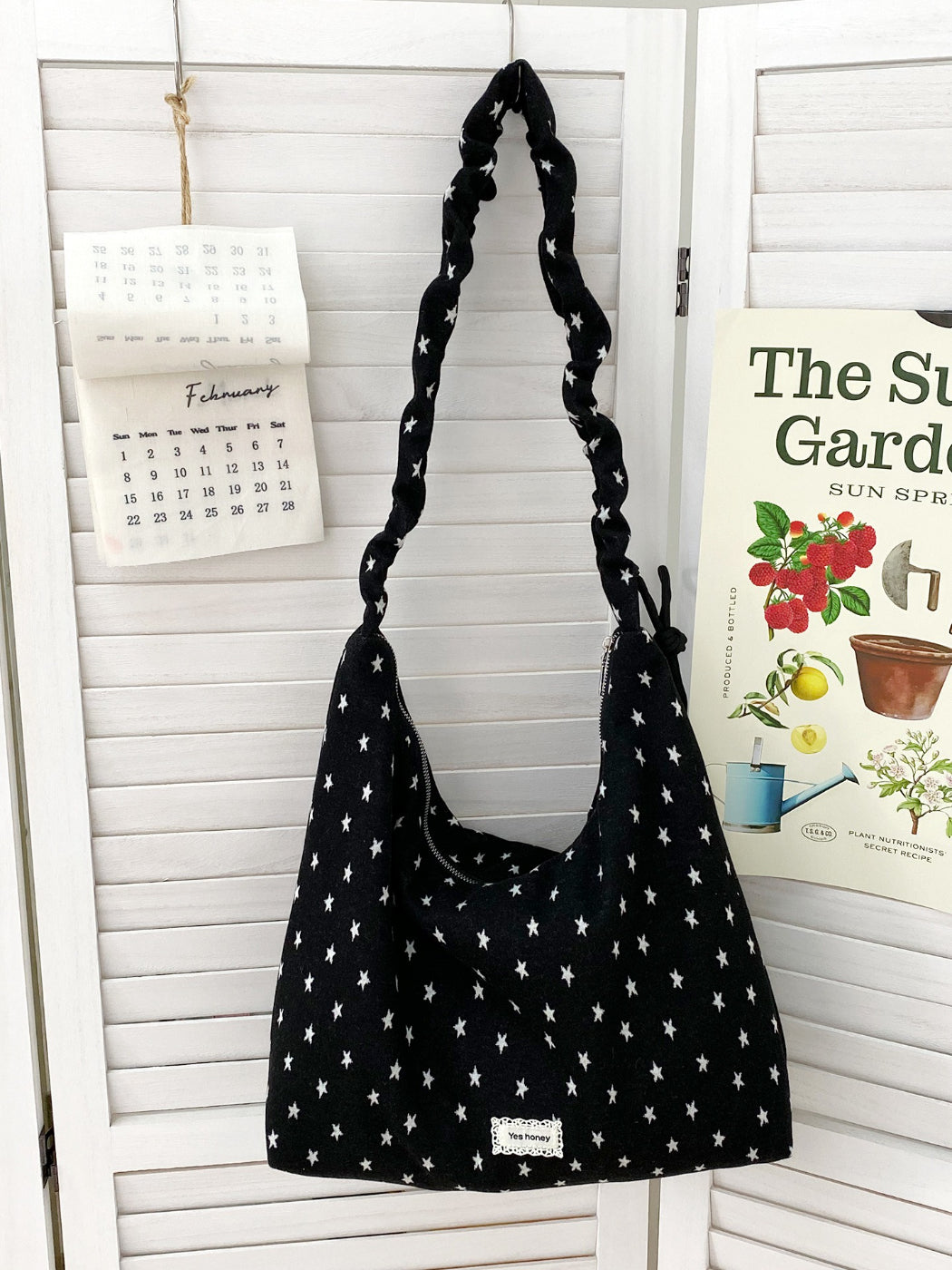 Cosbai Star Print Slouchy Shoulder Bag front view with black background