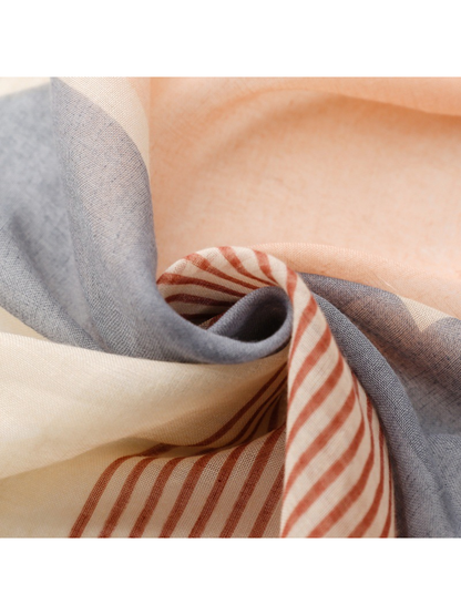 Mocha blue geometric scarf fabric swirl detail
