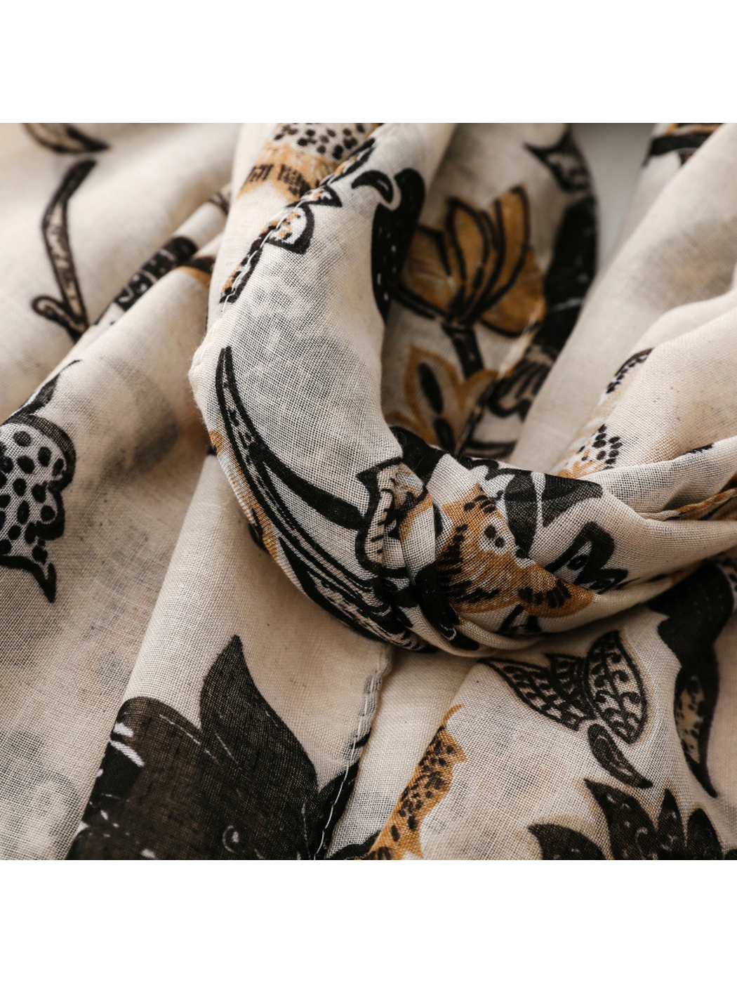 Ivory black botanical scarf drape detail