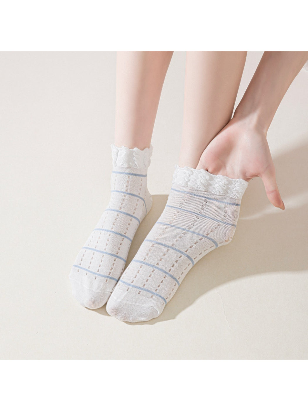 Rufia striped ankle socks displayed flat highlighting frill trim detail