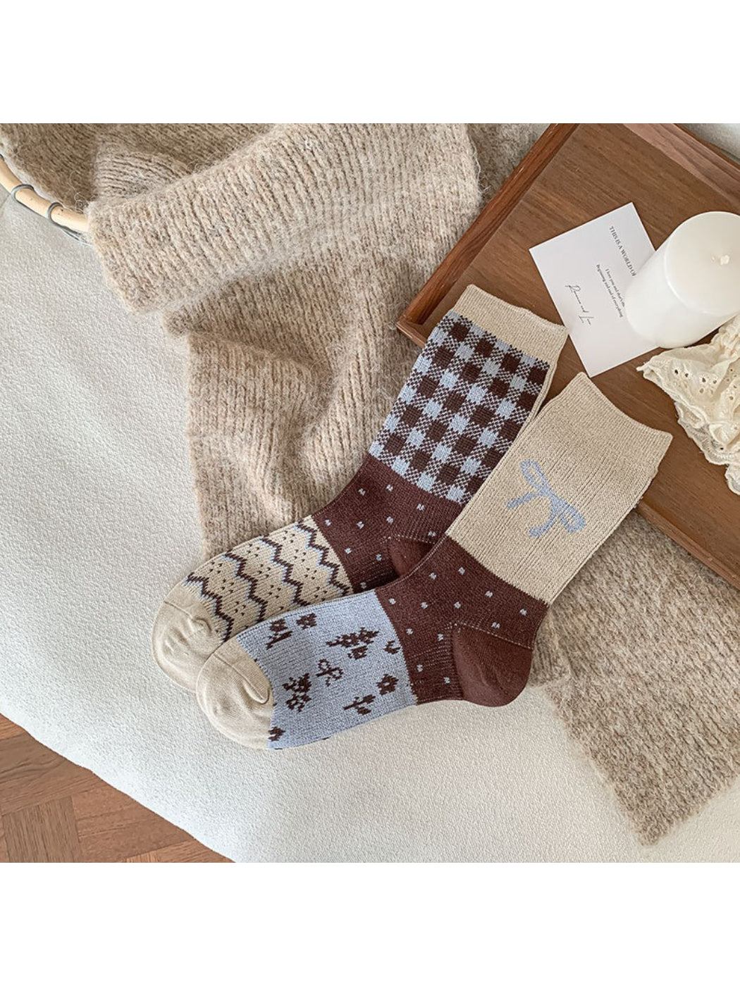 Rufia playful bow detail crew socks styled with rolled-up jeans