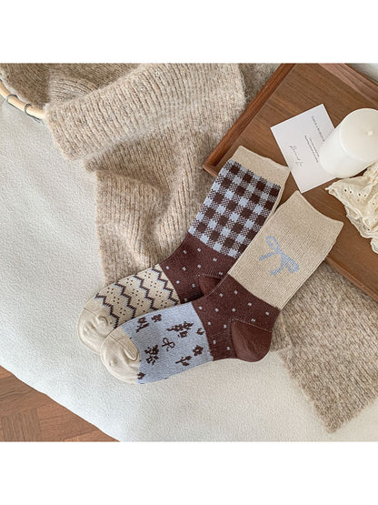 Rufia playful bow detail crew socks styled with rolled-up jeans