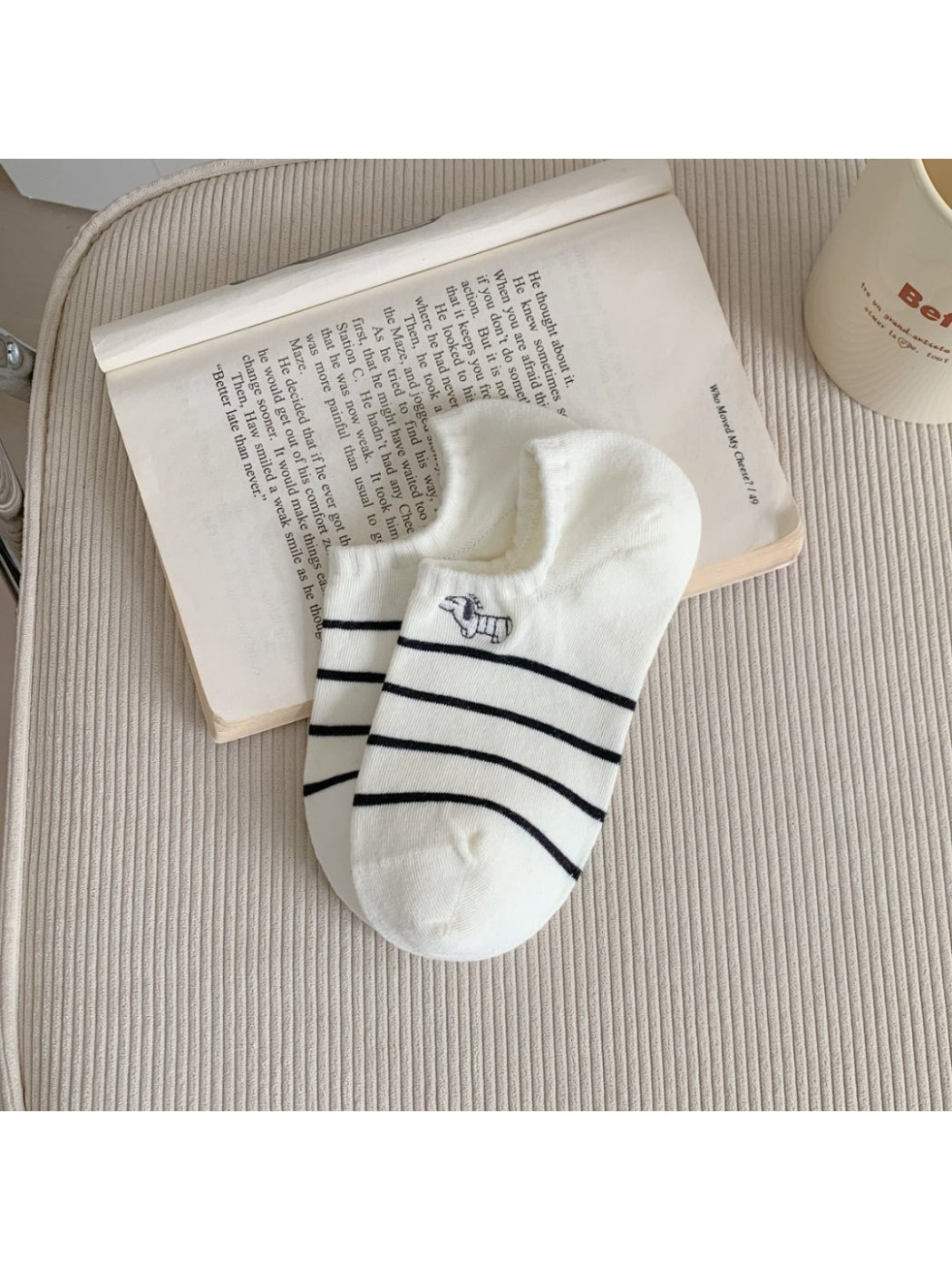 Rufia Dog Stripe No Show Socks laid out showing full dog stripe pattern on white background