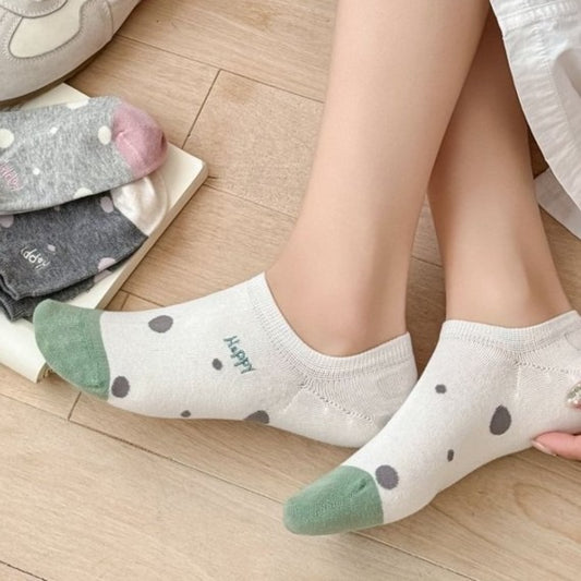 Pair of Rufia Happy Dot No Show Socks in white with colorful polka dots