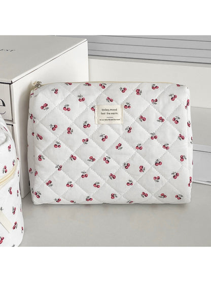 Soft quilted storage pouch with cherry pattern and