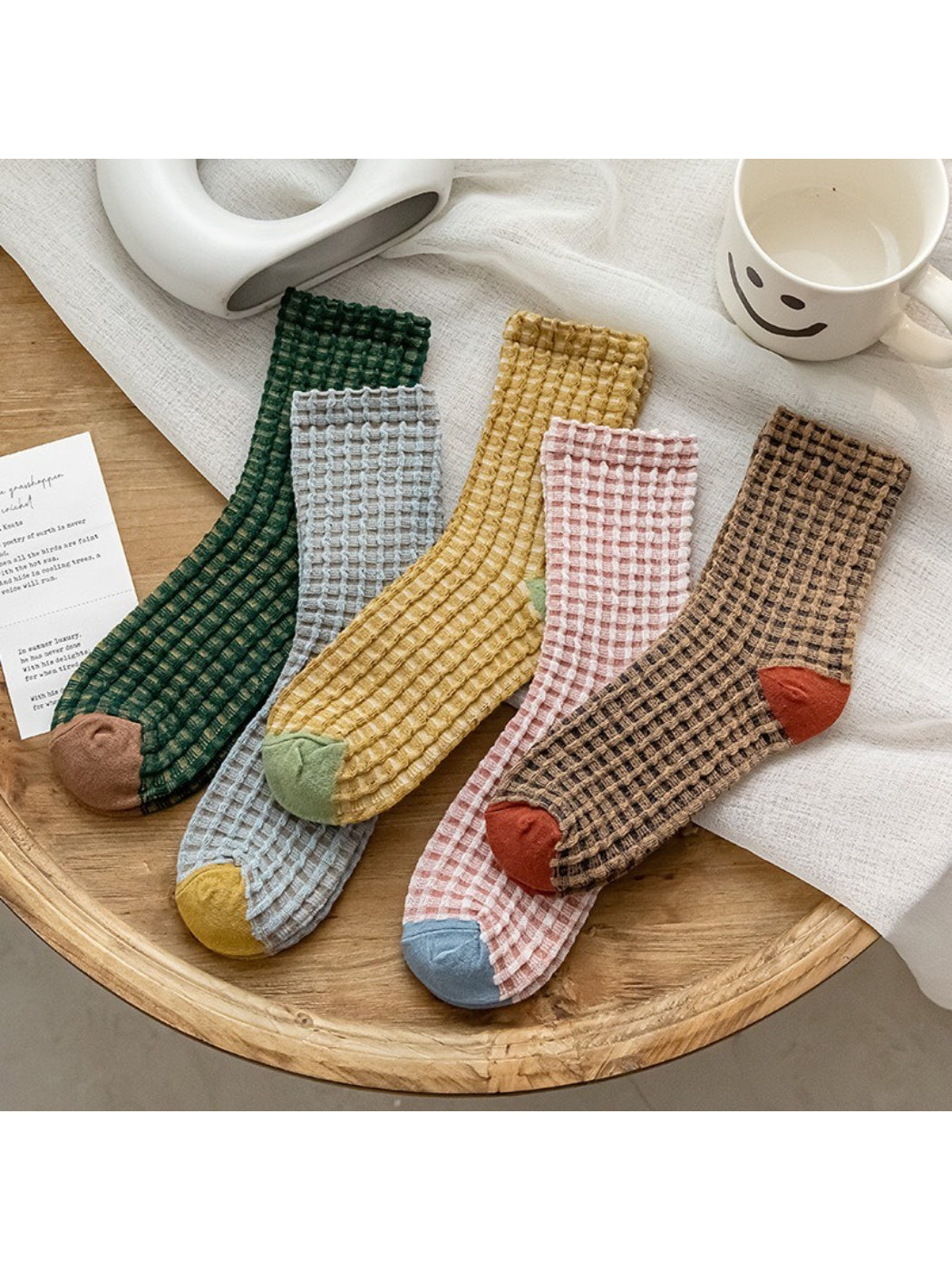 Pair of Rufia textured check knit crew socks in beige and brown tones