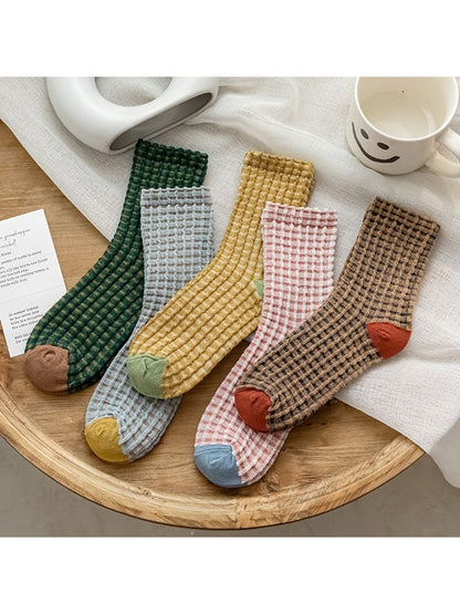 Pair of Rufia textured check knit crew socks in beige and brown tones
