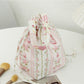 Close-up of Cosbai soft floral drawstring handbag showing floral design details