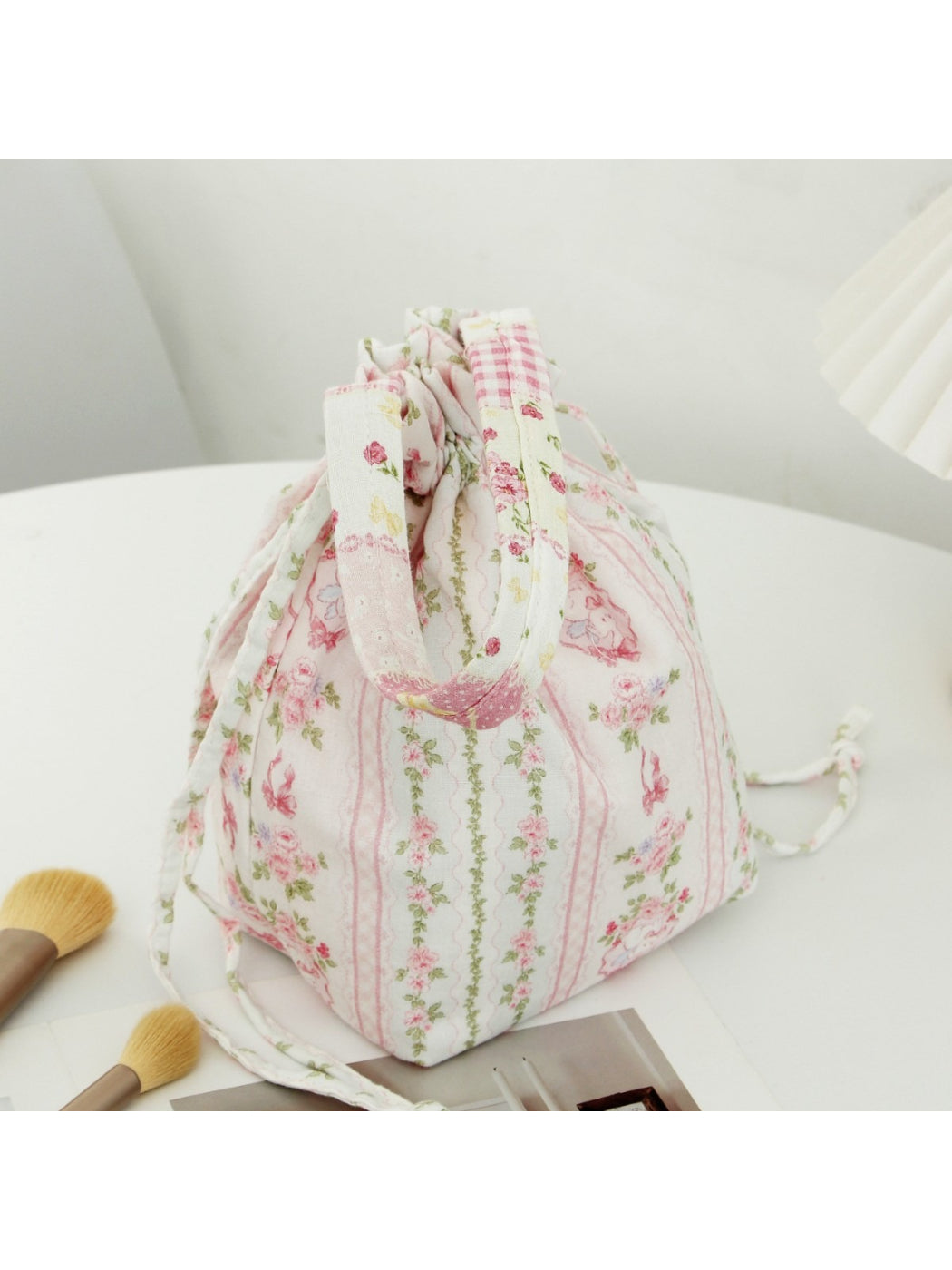 Close-up of Cosbai soft floral drawstring handbag showing floral design details