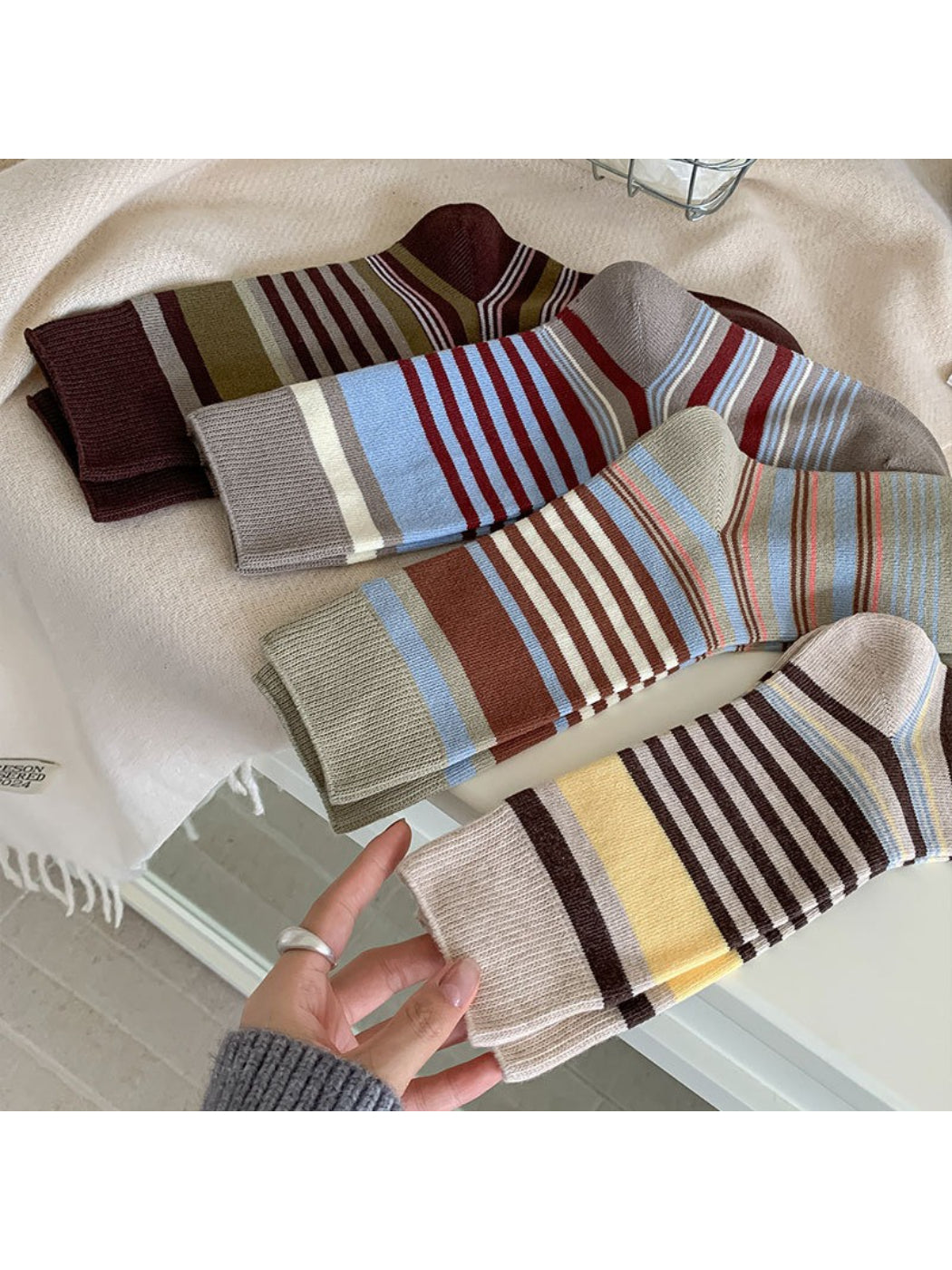 Rufia colorblock crew socks with bow pattern in pastel shades on white background