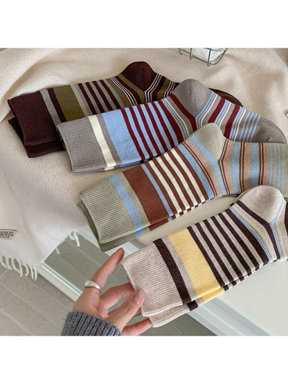 Rufia colorblock crew socks with bow pattern in pastel shades on white background
