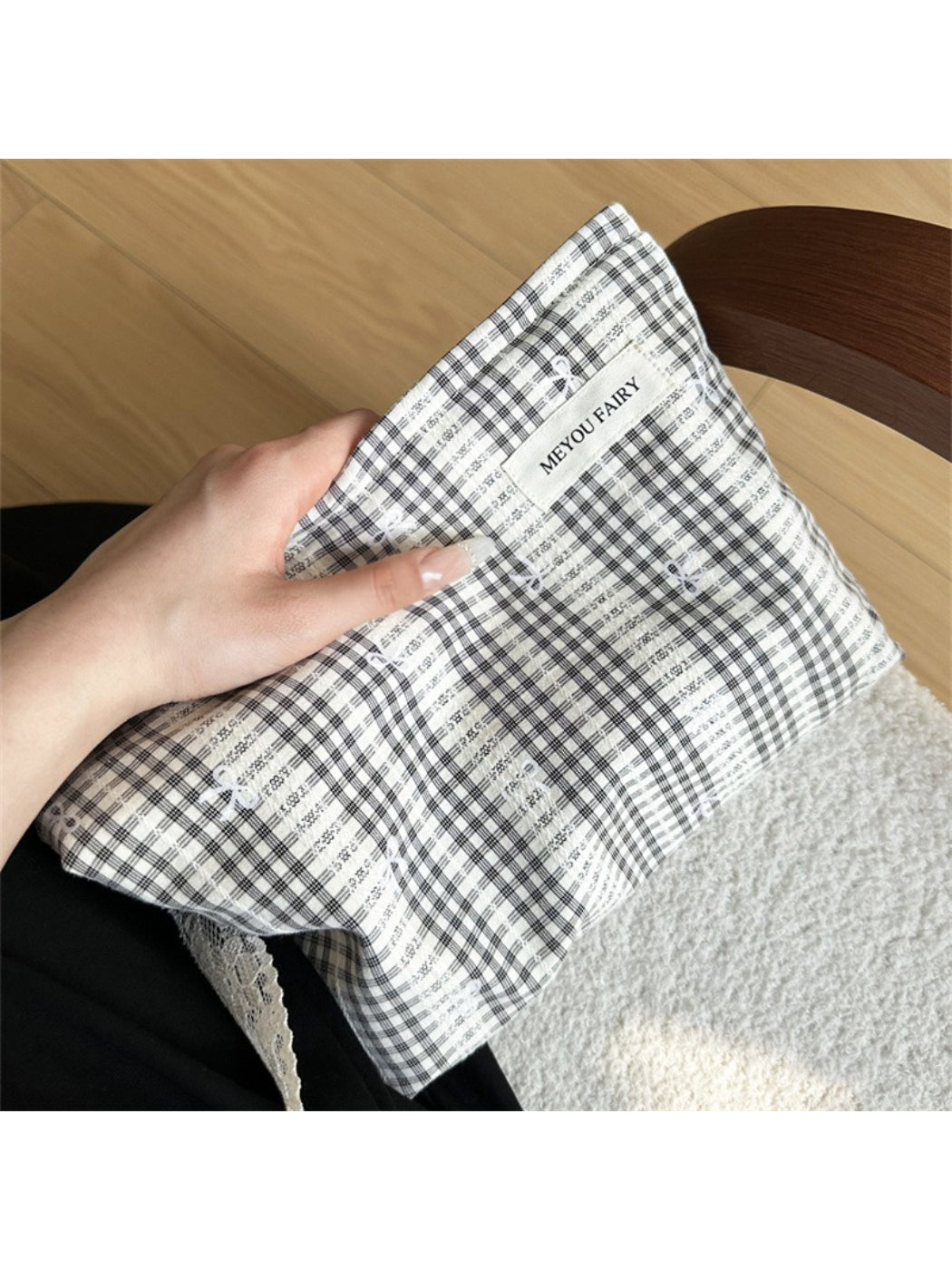Cosbai makeup pouch featuring a gingham pattern and bow accent