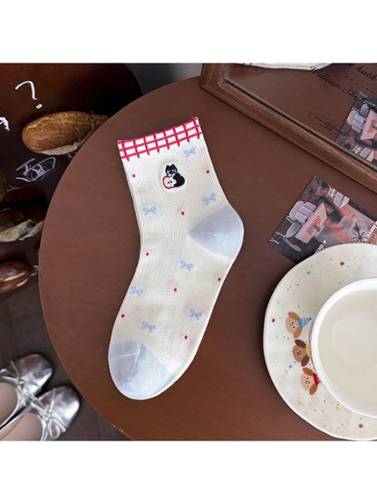 Rufia lace ruffle ankle socks arranged to show texture and lace pattern