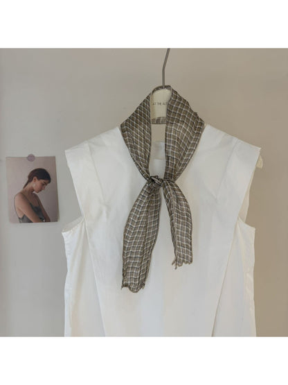 Scarvii skinny scarf styled with casual outfit featuring gingham and stripe design