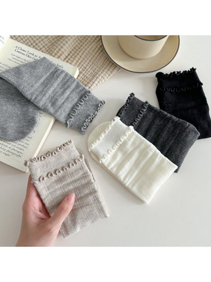 Rufia ruffle mid-calf socks in beige color displayed flat