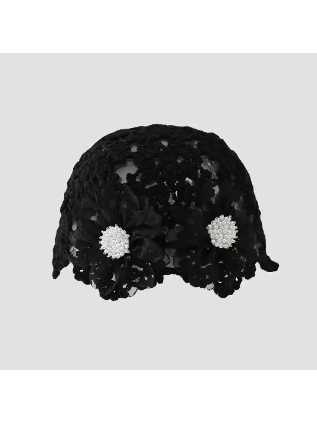 Haila romantic hat displayed on mannequin with flower detail and openwork texture